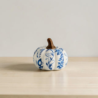 blue white pumpkins styled coffee table decor
chinoiserie pumpkin set styled kitchen counter
autumn decor pumpkins styled minimalist home
blue white pumpkins styled with neutral decor
fall styling blue white pumpkin home decor
pumpkins styled chinoiserie kitchen decor