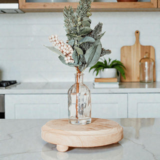 Rustic brown round wood tray and natural wood tray set
side by side rustic and natural wooden riser stands
bottom view of round wooden tray with ball feet
neutral round wood pedestal for candle and vase
elevated wooden tray for kitchen sink soap station