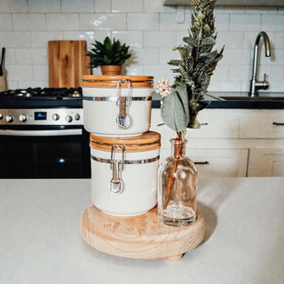 Elevate your decor with this rustic wooden tray stand! Handcrafted with legs for air circulation. Perfect for bathroom, vanity or kitchen. #raisedtray #woodendisplay #bathroomorganization #giaroma