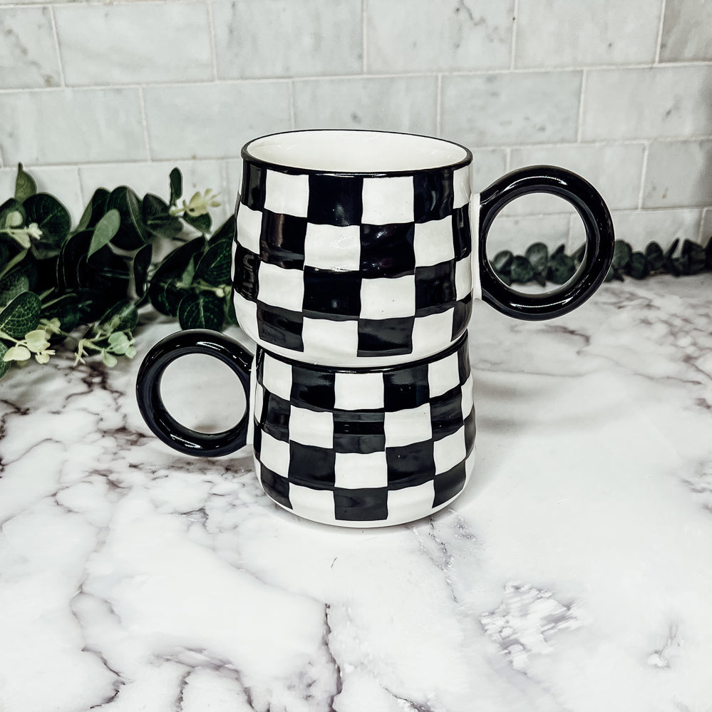 Black and white checkered coffee mugs