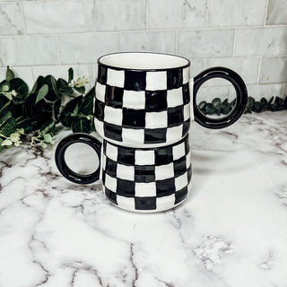 Black and white checkered coffee mugs