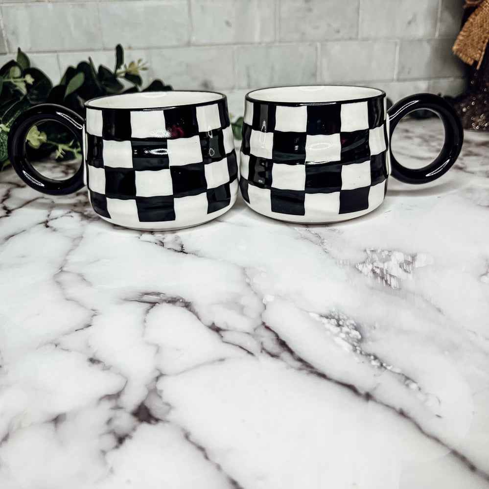 Monochrome coffee cups in black and white color