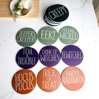 Microwave and dishwasher safe Halloween coasters with protective cork base
Mix and match Halloween coaster collection from Gia Roma's seasonal decor lin
Halloween coasters styled for luxury seasonal entertaining
Spooky coaster collection perfect for Halloween parties