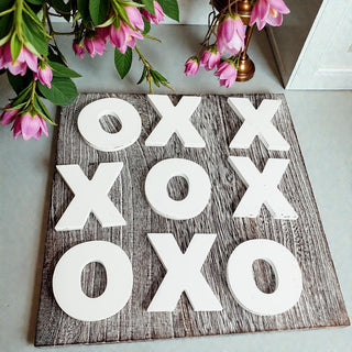 Handmade wooden tic tac toe board game rustic farmhouse decor
Rustic wood XO game tabletop decor with white letters
Farmhouse style tic tac toe board handmade USA
Wooden tic tac toe game distressed wood finish home decor
Rustic tabletop tic tac toe board with removable pieces