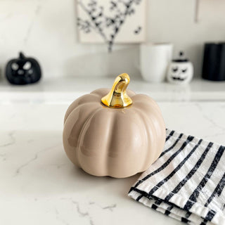 ceramic pumpkin set styled minimal home interior
autumn decor pumpkins styled on countertop
neutral pumpkins styled for fall photoshoot
modern pumpkin decor styled home setting
fall decor pumpkins styled with candles and greenery
neutral autumn decor styled kitchen scene
ceramic pumpkins styled for fall home inspiration
