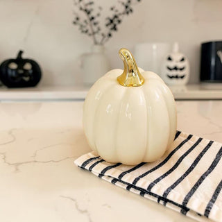 modern halloween decor neutral pumpkins gold stem
subtle halloween decorations neutral home decor
chic halloween pumpkin decor not spooky
classy halloween decor pumpkins neutral tones
minimal halloween home decor pumpkins ceramic
modern halloween styling pumpkins neutral palette
soft color halloween decor pumpkins gold accent