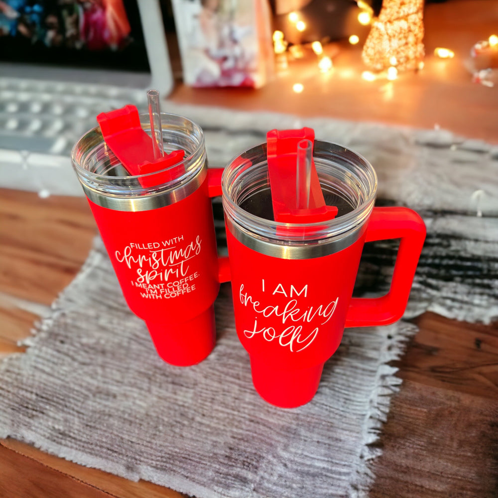 Red coffee mugs with lid and straw