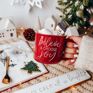 Cozy Christmas mug for hot chocolate and coffee
Believe Christmas mug for holiday gift idea
Choose Joy holiday ceramic coffee cup
Festive red ceramic Christmas coffee mug