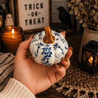neutral fall decor blue white pumpkins minimalist home styling
blue and white pumpkin set for coffee table fall display ideas
blue and white pumpkin decor styled in modern farmhouse kitchen
neutral home decor pumpkins blue white for minimalist interiors