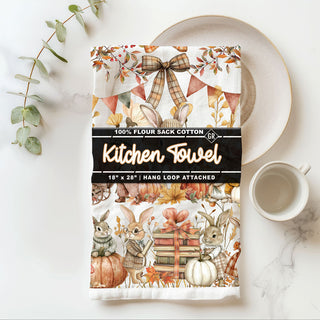 fall bunny print towel for coffee bar or tea station
autumn bunny and banner garland flour sack kitchen towel
cute rabbit gathering apples fall dish towel
autumn bunny towel used as thanksgiving hostess gift
fall bunny cotton towels modern and cute