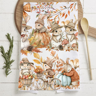 bunny themed fall tea towel on farmhouse cutting board
thanksgiving kitchen towel with cute bunnies and pumpkins
autumn bunny family towel for cozy cottage kitchen
autumn bunny and gingham banner flour sack dish towel