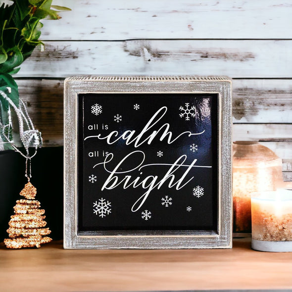 Black and White Holiday Sign that reads all is calm all is bright in white script