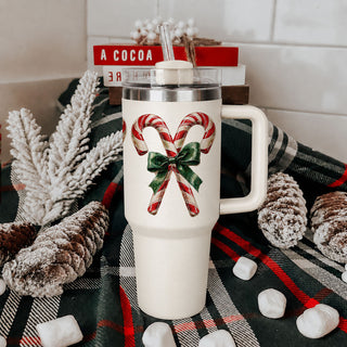 Christmas tumbler with holly candy canes and bows
Christmas tumbler with festive peppermint design
holiday peppermint tumbler for women
Christmas candy cane drink cup
retro peppermint Christmas tumbler
nostalgic candy cane holiday tumbler
old fashioned peppermint Christmas drinkware
classic candy cane Christmas cup
Christmas tumbler with red and green ribbon bows
candy cane Christmas pattern tumbler
festive peppermint pattern tumbler
red white peppermint holiday tumbler
Christmas peppermint cup with handle
