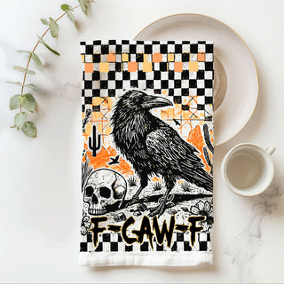 alternative halloween kitchen décor towel with raven graphic
dark humor halloween towel for gothic farmhouse kitchen
crow themed fall dish towel with orange accents
raven artwork tea towel with black and white checks
fall farmhouse halloween decor towel with raven and skull