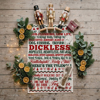 christmas kitchen towel held in front of decorated tree
holiday towel lifestyle outdoor christmas scene
kitchen towel funny quote styled holiday home
festive towel styled with christmas lights and decor
kitchen towel displayed cozy christmas background