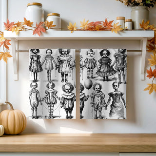 creepy halloween tea towel with haunted dolls
scary doll print kitchen towel for spooky décor
halloween dish towel with black and white horror clowns