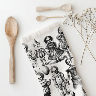 black and white horror clown towel for halloween home décor
scary doll illustration towel hanging on oven handle
creepy circus clown halloween flour sack cotton towel
spooky doll and balloon clown halloween dishcloth