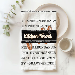 thanksgiving dish towel with fall phrases and typography
fall kitchen decor towel hanging on oven handle
Farmhouse fall words towel 
rustic fall photography with towel and black wood wall