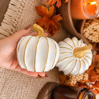white and gold pumpkins styled entryway table fall decor
clean modern fall decor white pumpkins gold details
neutral home styling fall decor white pumpkin accents
white pumpkins styled on kitchen island minimalist decor
chic fall decor white gold pumpkins modern interior
white pumpkin decor styled in beige neutral home