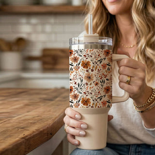 pumpkin spice floral cup aesthetic
neutral flower tumbler for moms
cute floral stanley dupe tumbler
cozy season flower tumbler
fall meadow floral cup
autumn floral water bottle aesthetic
cream floral tumbler with handle
cute floral cup for pumpkin patch
fall cottage aesthetic tumbler
neutral floral gift for coffee lovers