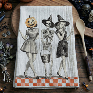mid century halloween print towel with skeleton trio
vintage halloween hostess gift cotton flour sack towel
retro halloween pinup girls towel for candy bar décor
black and orange vintage halloween tea towel for kitchen