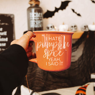 funny fall quote mug in warm toned kitchen
autumn hallway table decor with orange coffee cup
bold orange mug as pop of color in fall decor