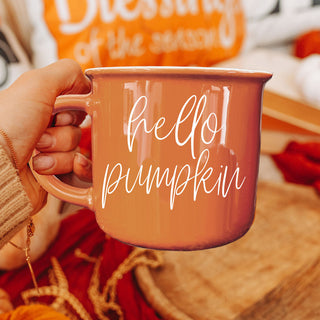hello pumpkin coffee mug in woman's hands
orange hello pumpkin mug for fall coffee
cozy fall coffee cup with hello pumpkin quote