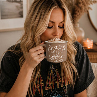 leaves falling coffee calling mug on wooden tray
brown leaves falling coffee calling coffee mug
fall coffee mug with leaves falling coffee calling quote
autumn kitchen decor brown mug leaves falling coffee calling
cozy fall coffee cup with leaves falling coffee calling text
neutral brown autumn mug for coffee lovers
