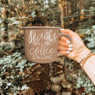 leaves falling coffee calling mug used as fall kitchen accent
cozy autumn corner with chair blanket and brown coffee mug
fall inspired flatlay featuring brown quote mug and foliage
brown ceramic autumn mug in boho style kitchen
leaves falling coffee calling mug paired with fall dish towel