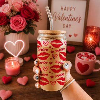 Fun and flirty 20oz glass cups featuring red lips and XOXO for her.
20oz glass tumblers with red lips, hearts, and XOXO for a chic Valentine’s gift resalers. 
Fun and trendy 20oz glass cups with red lips and pink XOXO for a unique gift.
20oz glass tumblers with bold red lips, hearts, and XOXO for Valentine’s Day.