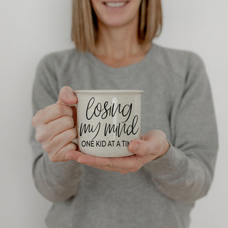 coffee bar decor mug for tired mama
unique baby shower gift losing my mind mug
funny mug for second time and third time moms
everyday mom coffee cup with honest quote
losing my mind mug for carline coffee
large handle ceramic mom mug with funny saying