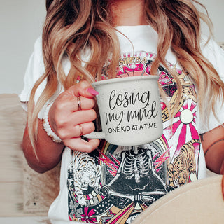 from kids to mom losing my mind coffee mug
gift from husband to wife funny mom mug
baby shower gift for second time mom mug
baby shower gift for third time mom funny mug
new mom gift losing my mind one kid at a time mug
gift set idea with coffee and mom humor mug
funny mom gift basket mug centerpiece