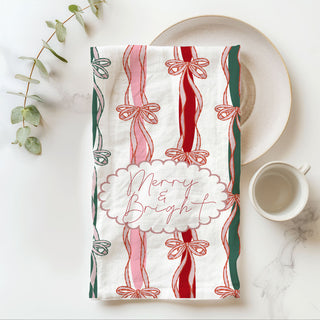 scalloped label christmas towel merry and bright script design
retro inspired christmas towel with ribbon stripe aesthetic
whimsical christmas kitchen towel bow and stripe pattern
storybook christmas decor towel festive ribbon detailing
cottage christmas kitchen towel bow stripe design aesthetic