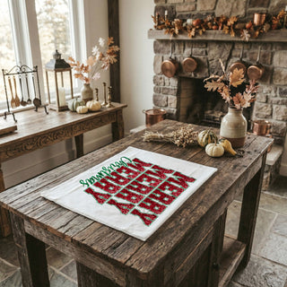holiday towel styled with candles greenery and baking items
kitchen towel for christmas decor with cozy winter theme
festive towel for decorating farmhouse kitchen holiday style
holiday towel used for christmas table and kitchen styling
christmas linen towel displayed in cozy holiday kitchen