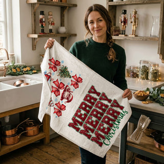 christmas kitchen cloth with dual print design festive holiday theme
seasonal kitchen towel with bold graphics
christmas dish cloth with decorative holiday artwork and text design
kitchen towel christmas themed with mixed graphic and lettering styles
festive cotton dish towel with holiday illustration and script wording
holiday kitchen linen with santa motif and christmas message print
decorative christmas towel with seasonal themed artwork and typography
