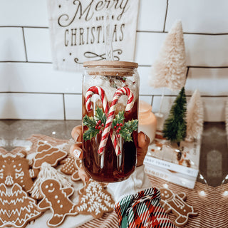 Festive drinkware gift – 17oz glass tumbler with holly wreath and candy cane design
Christmas morning coffee cup – glass tumbler with candy cane wreath wrap