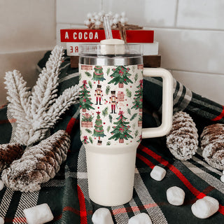 Christmas tumbler with nutcracker guards and trees
vintage toy soldier holiday drinkware
traditional nutcracker Christmas cup
nutcracker Christmas travel tumbler for her
Christmas soldier beverage tumbler
festive nutcracker water tumbler
nutcracker iced coffee cup for Christmas
holiday tumbler with soldier and present design
Christmas tumbler with toy soldiers and gift boxes
nutcracker Christmas cup with festive greenery
pink holiday nutcracker tumbler
green Christmas tree nutcracker tumbler