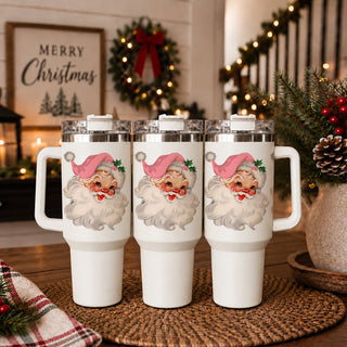 vintage Santa graphic Christmas drinkware
retro pink Santa print tumbler
festive Santa artwork on white tumbler
Christmas tumbler with nostalgic Santa graphic
pink Santa holiday design closeup
retro Santa Claus face travel cup
vintage Santa illustration on handled tumbler
pink hat Santa Christmas cup detail
Santa face holiday tumbler product
retro holiday Santa design on travel cup
vintage Santa Christmas artwork drinkware
cheerful Santa Claus face tumbler
rosy cheek vintage Santa drink cup
Christmas Santa 