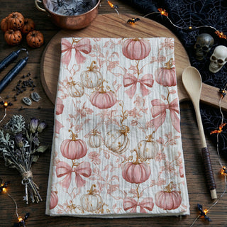 pastel fall kitchen towel with pumpkins and vintage florals
pink farmhouse fall towel hanging on oven handle
chic pink pumpkin tea towel for modern autumn décor
white and blush pumpkin towel for pink fall kitchen
romantic fall pumpkin towel with soft pink color palette