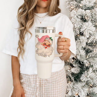 holiday water tumbler with Santa design
festive travel cup with vintage Santa
large Santa Christmas drink cup
40 ounce Santa holiday drinkware
Christmas tumbler with large side handle
handled Santa Claus holiday tumbler
Christmas cup with lid and retro Santa
reusable vintage Santa travel cup
holiday beverage tumbler with Santa artwork
festive Santa water cup for winter
retro Santa coffee tumbler for December
Christmas morning Santa coffee cup
holiday season pink Santa tumbler
cozy winter Santa drinkware
