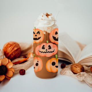 Watercolor pumpkin face glass tumbler with bamboo lid and straw
Halloween themed glass drinking cup with jack o lantern designs
