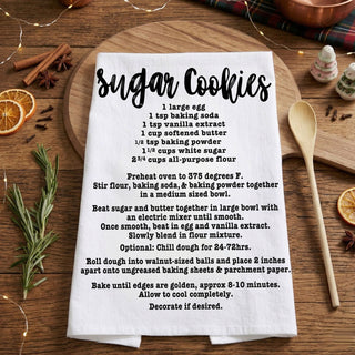 kitchen towel baking recipe styled farmhouse decor
holiday towel styled with baking tools and wood board
flat lay kitchen towel recipe baking christmas scene
kitchen towel styled cozy home baking environment
christmas towel displayed in festive kitchen setting