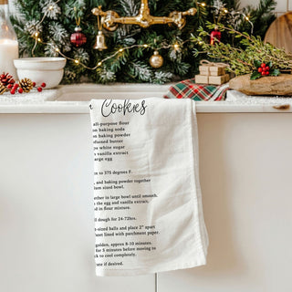 christmas recipe kitchen towel flat lay baking scene
holiday towel styled with rolling pins cookies and decor
festive kitchen towel with baking setup christmas styling
christmas towel styled with holiday baking accessories
holiday recipe towel styled cozy kitchen decor