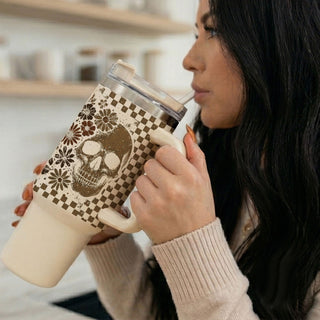 Retro fall checkered 40oz tumbler with ghost design

Spooky floral 40oz tumbler with skull and checker pattern

Vintage autumn tumbler with ghost and floral graphic

Brown checkered 40oz tumbler with fall ghost print

Halloween-inspired 40oz tumbler with skull and florals