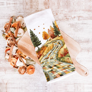 fall path kitchen towel perfect for guest bathroom décor
autumn fields and trees towel for farmhouse tiered tray
patchwork stone road towel for fall bread basket liner
fall foliage kitchen towel for october and november décor
