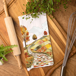 patchwork fall hillside towel for farmhouse coffee bar
neutral white towel with colorful autumn road print
autumn tree line road towel for seasonal kitchen styling
fall dish towel gift with scenic patchwork country road