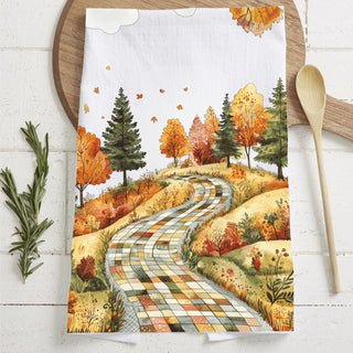 Cozy autumn charm to your home with this patchwork road fall kitchen towel. Featuring a winding quilt-style path through colorful fall trees and leaves, this soft, absorbent flour sack cotton towel is perfect as a fall dish towel, tea towel or hand towel. A beautiful farmhouse autumn kitchen décor accent and thoughtful Thanksgiving or housewarming gift for fall lovers.