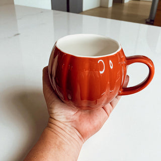 Handmade autumn pumpkin coffee cups - seasonal kitchen decor accessories
Morning coffee pumpkin mugs - fall kitchen essentials in ceramic white and orange