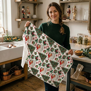 christmas dish towel festive santa and gift pattern
holiday kitchen towel traditional christmas design
christmas towel with bows candy canes and ornaments
festive dish towel santa tree holiday kitchen decor
christmas towel classic red green holiday pattern