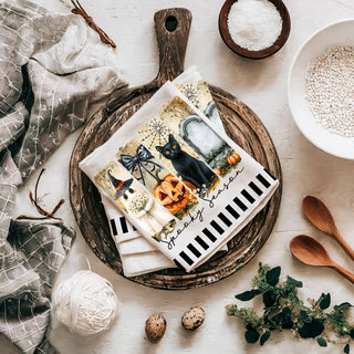 ghost and pumpkin halloween towel for coffee bar décor
black cat lover halloween kitchen towel spooky design
trendy spooky season towel for fall home décor
jack o lantern and black cat dish towel with graveyard background